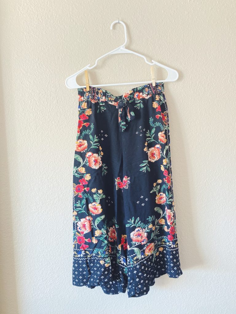 Floral pants hanging.